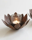 Rustic glass tealight candle holder with floral design, ideal for home decor by Terrace & Garden Ltd.