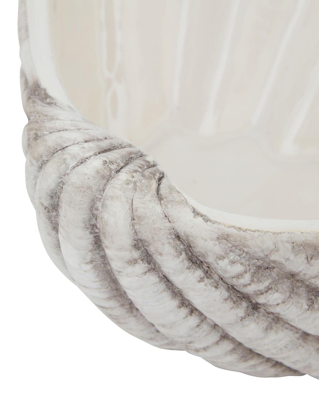 Large matte neutral stone clam shell bowl, home decor piece by Hill Interiors, featuring a natural textured clam shell shape.