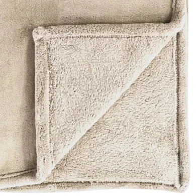 Cream Luxury Snuggle Blanket Throw, close-up of the cream fabric and stitched edging