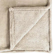 Cream Luxury Snuggle Blanket Throw, close-up of the cream fabric and stitched edging