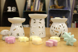 White small tree-shaped wax melt burner by Ancient Wisdom, featuring a ceramic design for aromatic oil and wax melts.