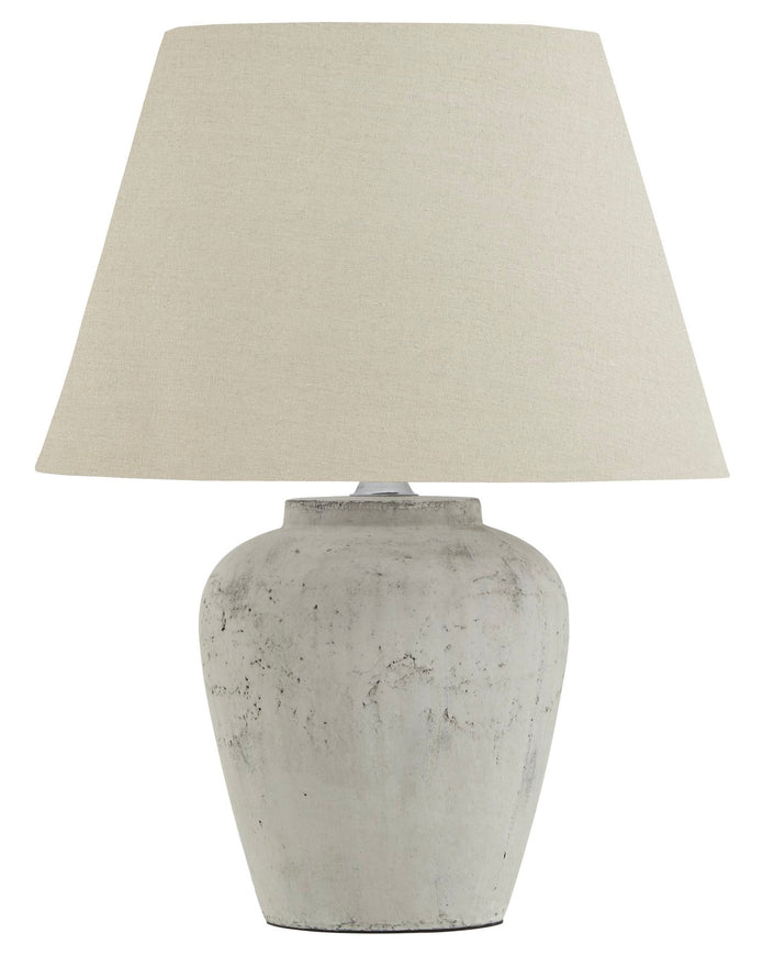 Amesbury Medium Stone Lamp by Hill Interiors, stylish lighting with a textured stone base and a neutral lampshade.