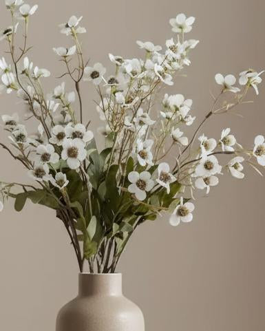 Artificial white daisy flower stem from Starlight Express, realistic faux plant with detailed white petals and green stem.