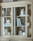 Delphine Collection sliding glass dresser top by Hill Interiors, showcasing sleek glass surface and modern furniture design.