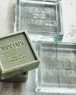 Square glass soap dish from Terrace & Garden Ltd, designed for home fragrance display with clear, modern glass construction.