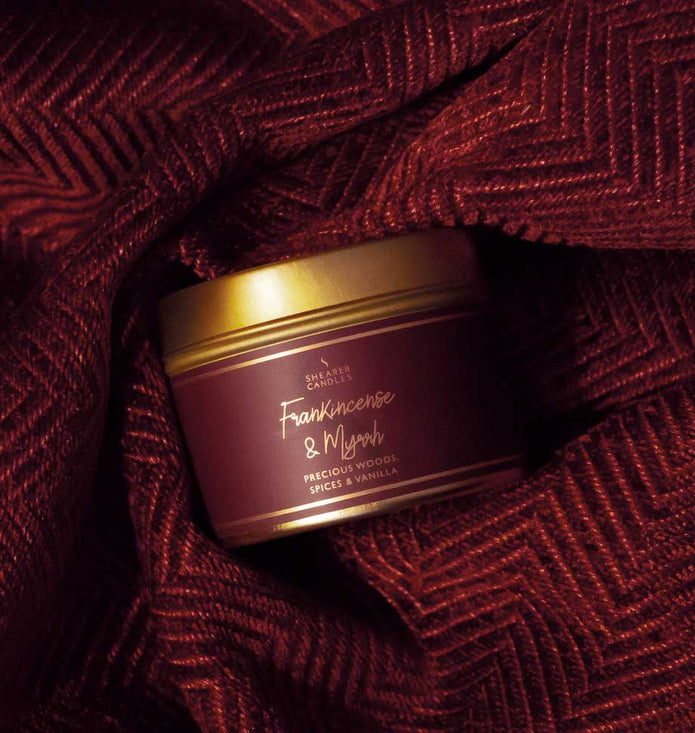 Small tin candle with frankincense and myrrh scent, designed for Christmas by Shearer Candles, featuring a festive holiday fragrance.