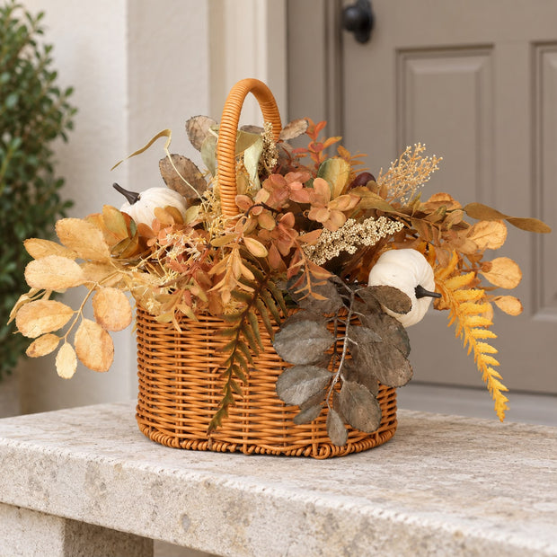 Russet Autumn Leaves Basket, wicker basket filled with russet autumn leaves on stone