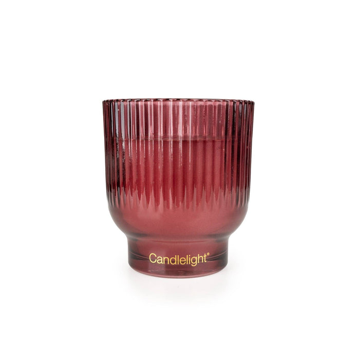 Burgundy medium ridged footed glass candle for Christmas by Candlelight Products Ltd, with a festive holiday design.