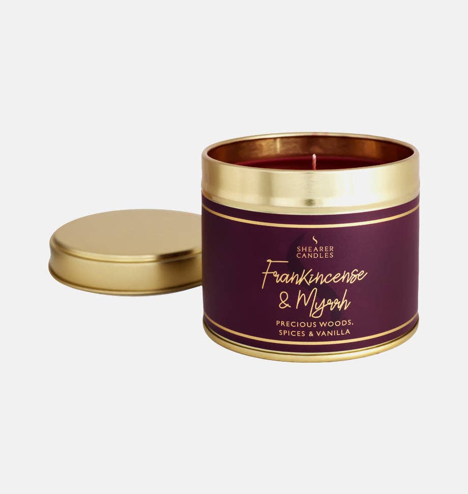 Large Shearer Candles Christmas frankincense and myrrh tin candle with festive holiday packaging and natural fragrance.