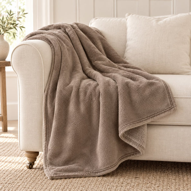 Beige Luxury Snuggle Blanket Throw, beige throw draped over a cream sofa