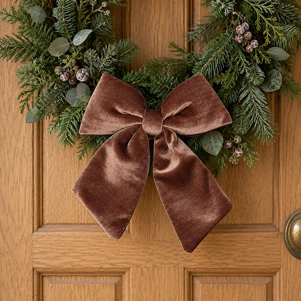 Velvet chocolate brown Christmas clip-on bow by Widdop & Co, featuring soft fabric and festive holiday design.