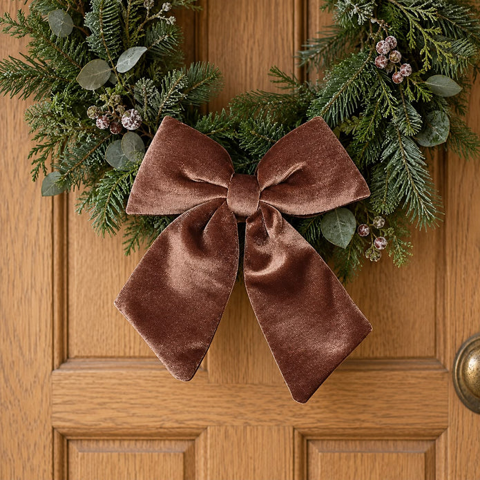 Velvet chocolate brown Christmas clip-on bow by Widdop & Co, featuring soft fabric and festive holiday design.