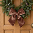 Velvet chocolate brown Christmas clip-on bow by Widdop & Co, featuring soft fabric and festive holiday design.
