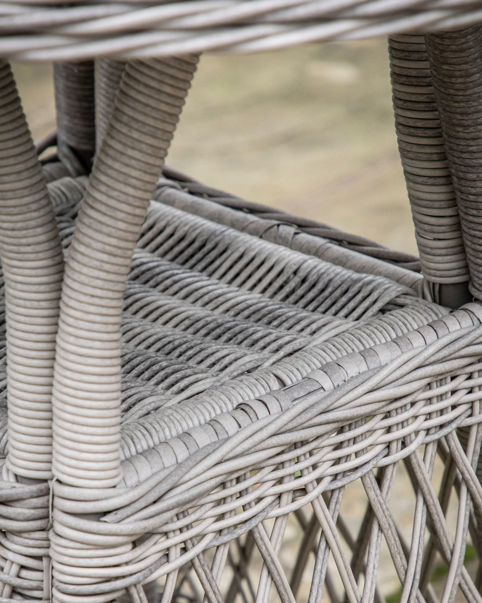 Natural rattan Menton two-seat bistro set for garden, includes matching table and chairs by Gallery Direct.