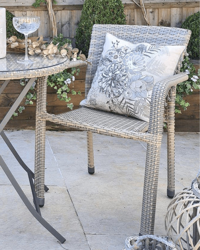 Natural rattan bistro garden furniture set with a table and chairs by Pacific Lifestyle Ltd, perfect for outdoor patio dining.