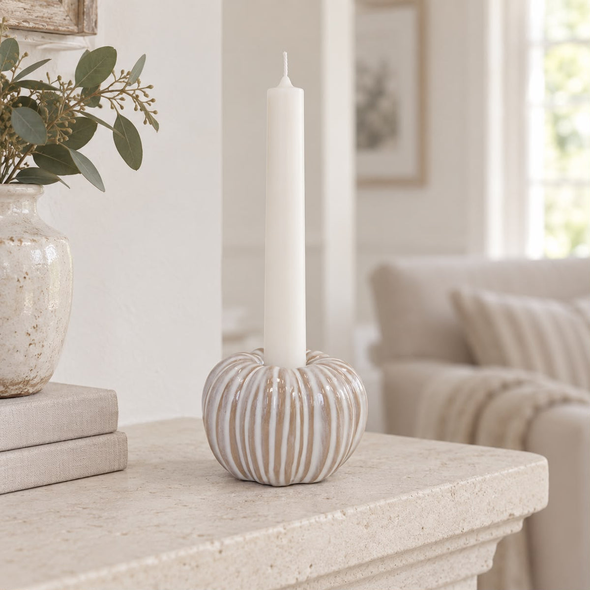 Ceramic Natural Pumpkin Dinner Candle Holder, striped pumpkin candle holder on a mantel
