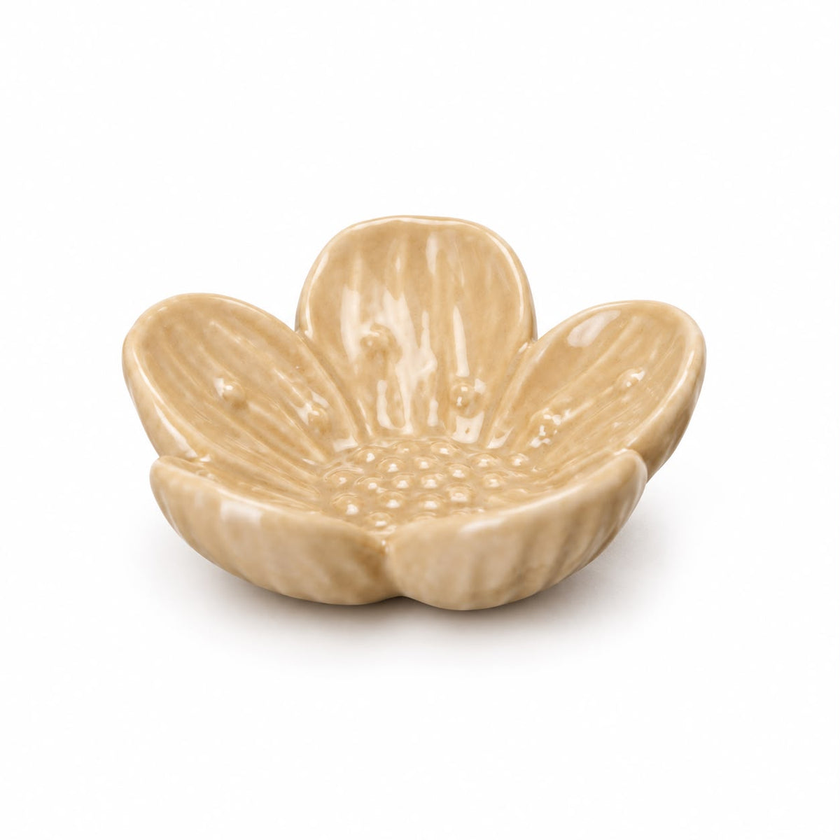 Small beige flower trinket dish on white