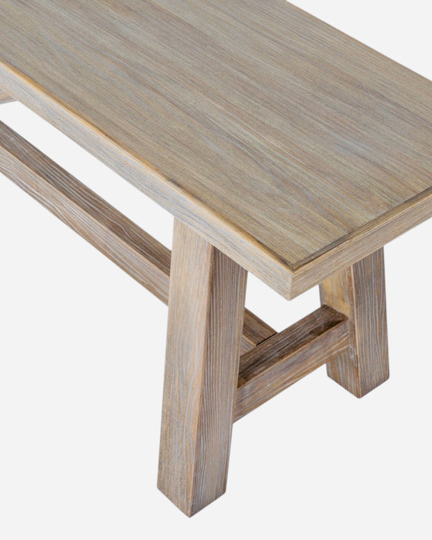 Large wooden dining bench from Hill Interiors' Haldon Collection, featuring a sturdy design and natural finish.