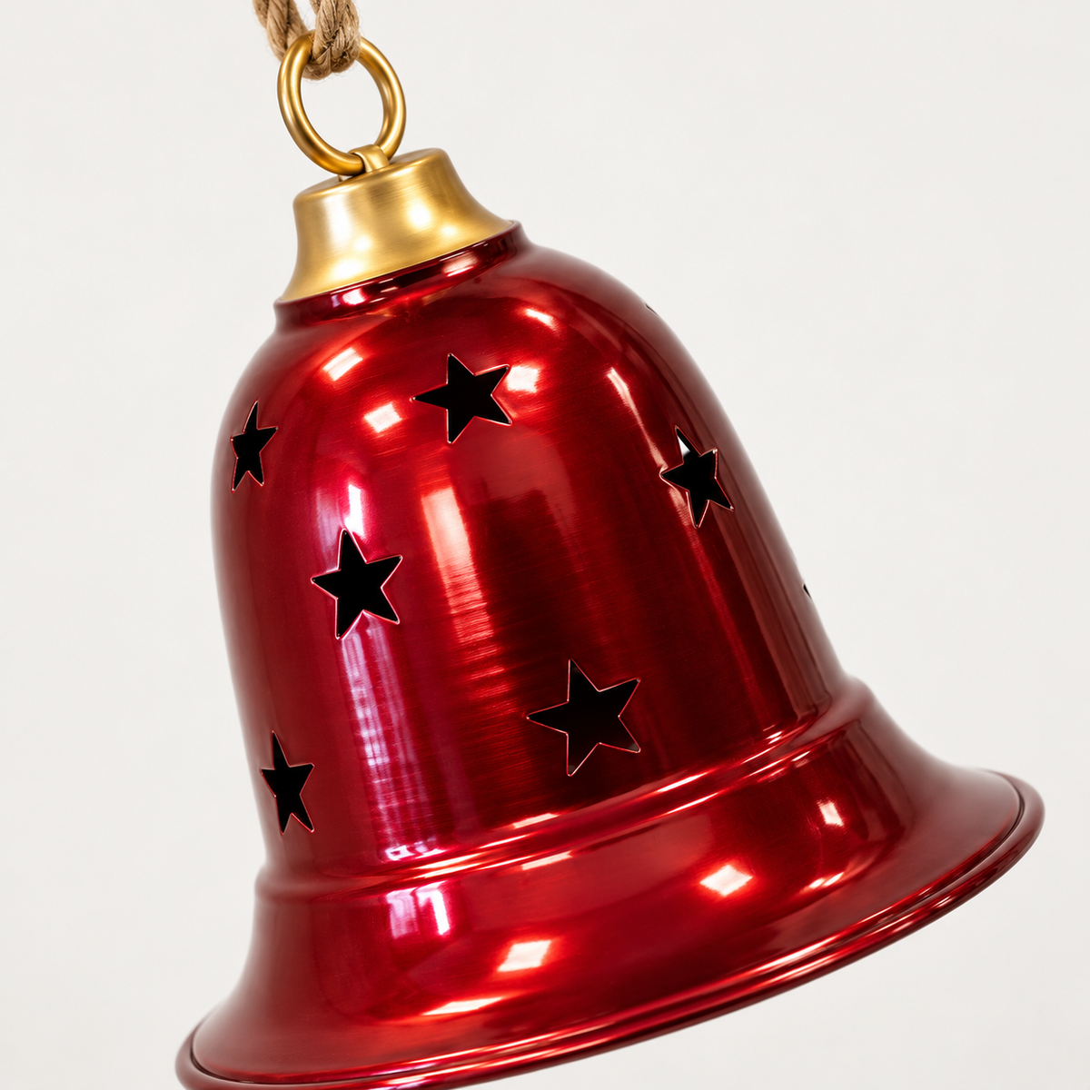 Close-up of the glossy burgundy bell, flared rim and star-shaped cut-outs