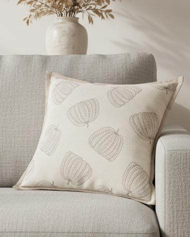 Neutral Beige Printed Pumpkin Cushion Cover, neutral cushion with small outlined pumpkins on a sofa