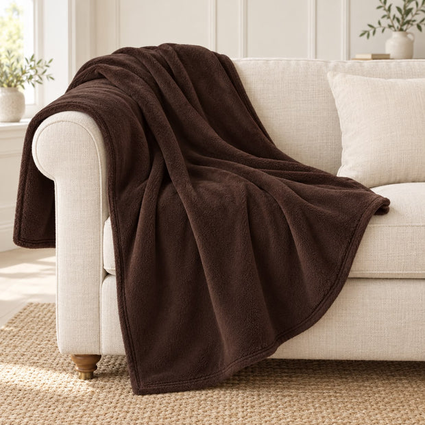 Chocolate Brown Luxury Snuggle Blanket Throw, chocolate brown throw draped over a cream sofa