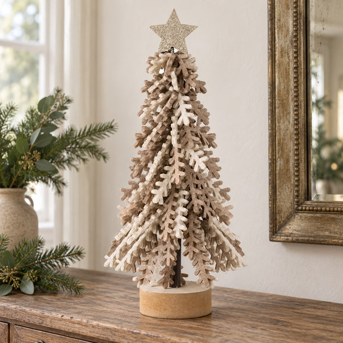 Twisted Brown Leaves Tree With Gold Star, layered tree with a gold star on a wooden console