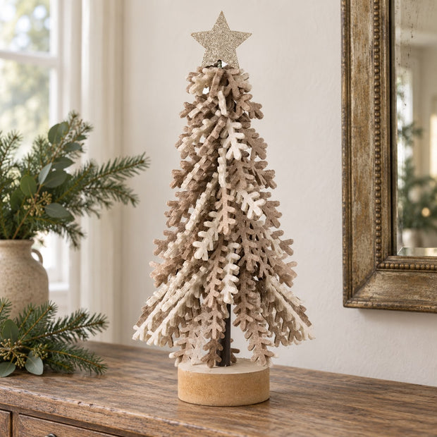 Twisted Brown Leaves Tree With Gold Star, layered tree with a gold star on a wooden console