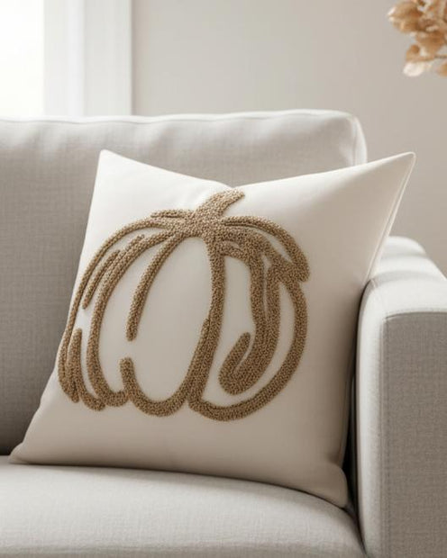Beige Chenille Pumpkin Cushion Cover, beige pumpkin-outline cushion on a cream armchair