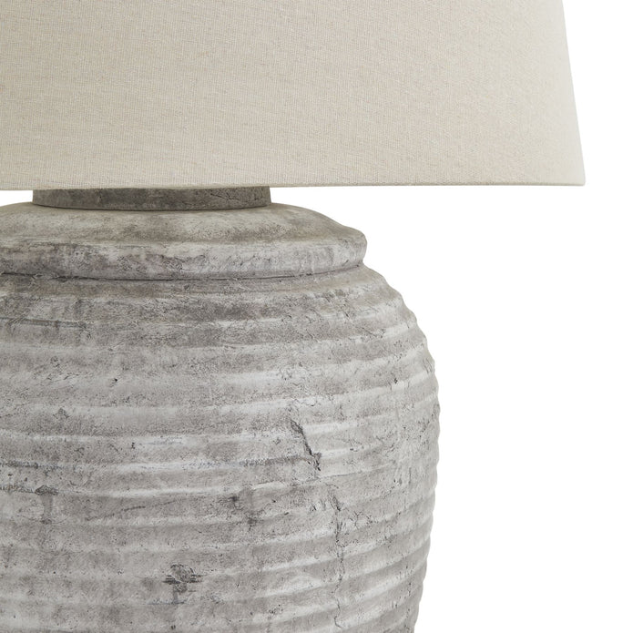 Harrogate Ribbed Stone Lamp by Hill Interiors featuring a textured, ribbed stone base and a neutral shade for elegant lighting.