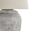 Harrogate Ribbed Stone Lamp by Hill Interiors featuring a textured, ribbed stone base and a neutral shade for elegant lighting.