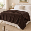 Chocolate Brown Luxury Snuggle Blanket Throw, chocolate brown throw spread over a neutral bed