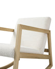 Cream boucle Sherpa rocking chair from Starlight Express with plush upholstery and wooden rocking base.