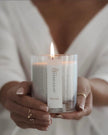 White scented candle in a sand jar with dark honey fragrance, from The Candledust home fragrance collection.