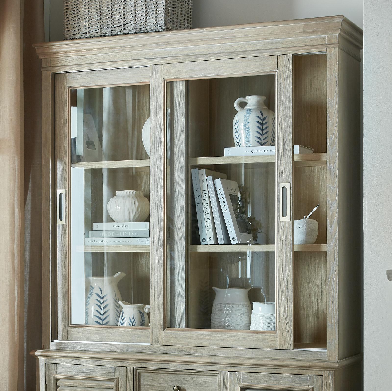 Sliding glass dresser top from Hill Interiors' Delphine Collection, showcasing clear glass panels and sleek modern design.