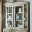 Sliding glass dresser top from Hill Interiors' Delphine Collection, showcasing clear glass panels and sleek modern design.