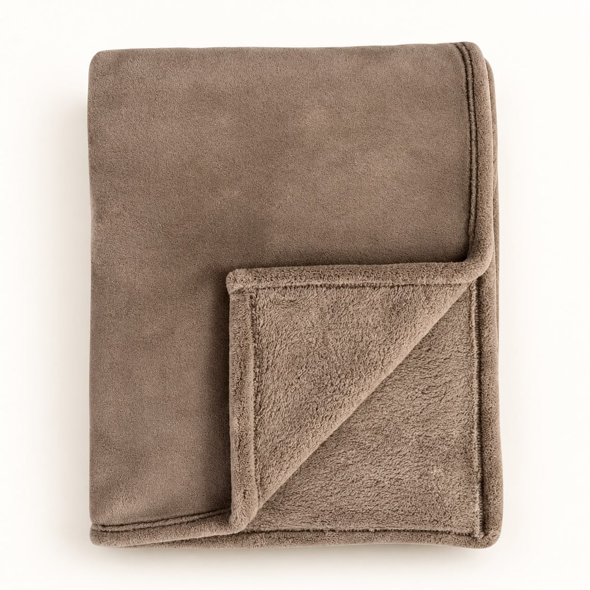 Beige Luxury Snuggle Blanket Throw, folded beige throw with its corner turned back on white
