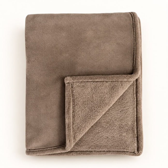 Beige Luxury Snuggle Blanket Throw, folded beige throw with its corner turned back on white