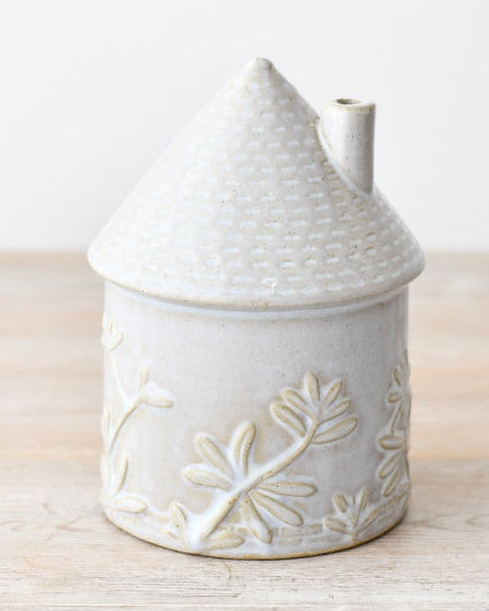 White Ceramic House With Flower Detailing