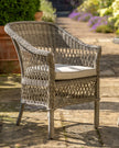 Natural rattan Menton two-seat bistro set for garden from Gallery Direct, featuring woven rattan chairs and matching table.