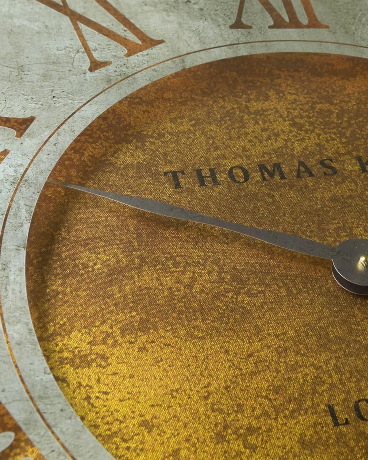 Thomas Kent Florentine Star wall clock, 21-inch round clock with a vintage-inspired star design and black clock hands.