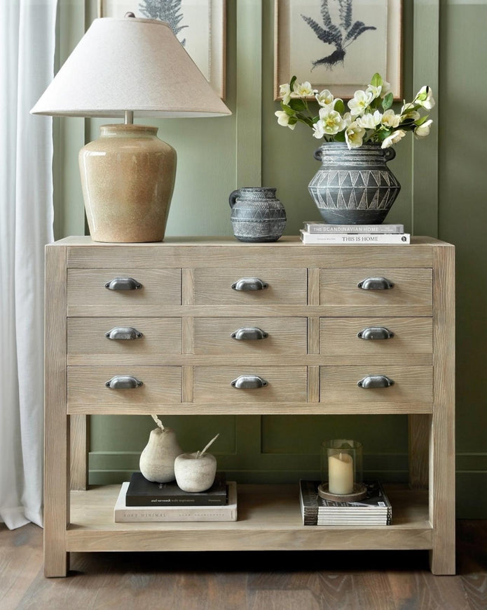 Hill Interiors Haldon Collection 9-drawer chest with top shelf, wooden furniture piece with sleek drawer handles and a modern design.