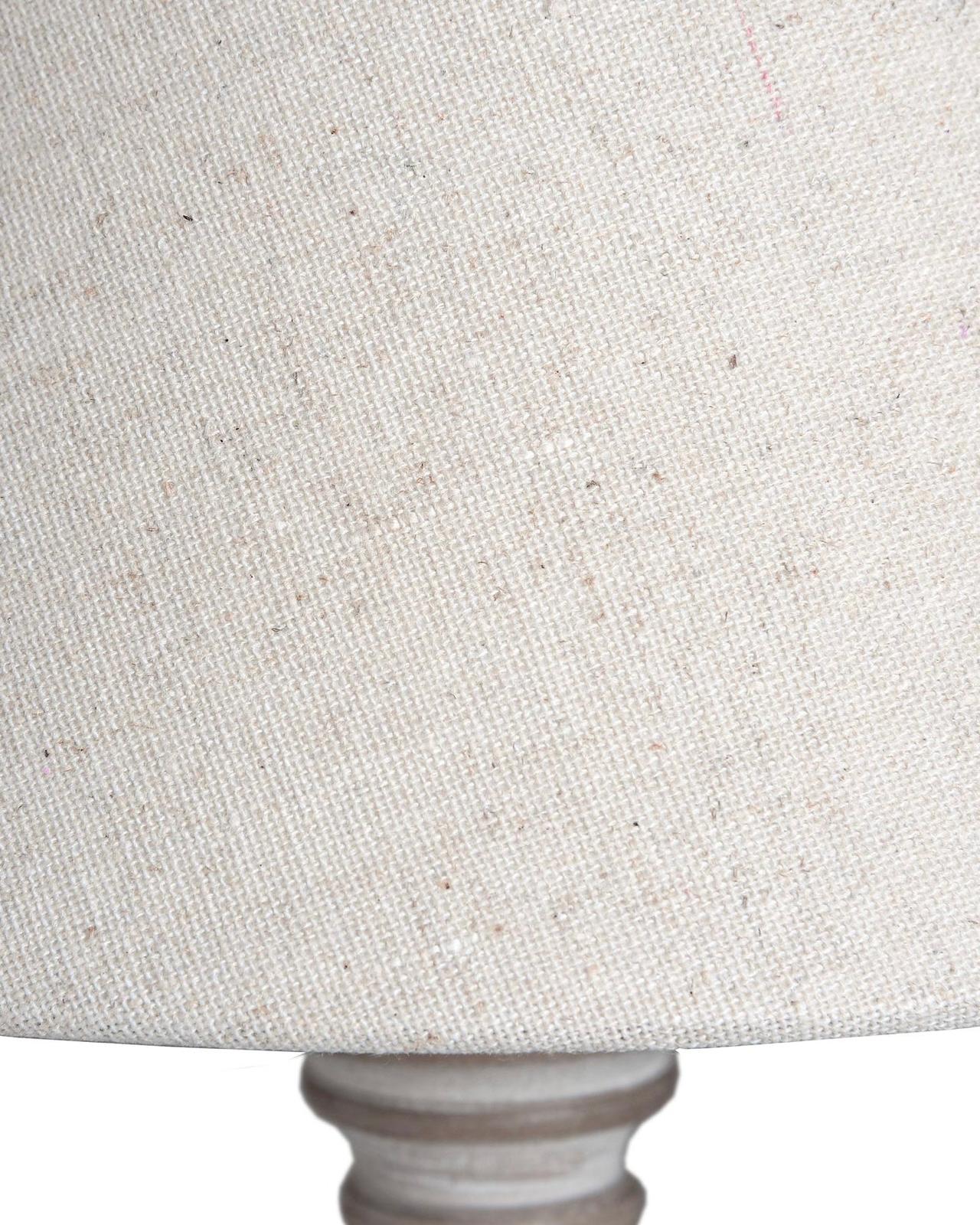 Hill Interiors Pella Wooden Table Lamp with a warm-toned wooden base and fabric shade, perfect for cozy lighting.