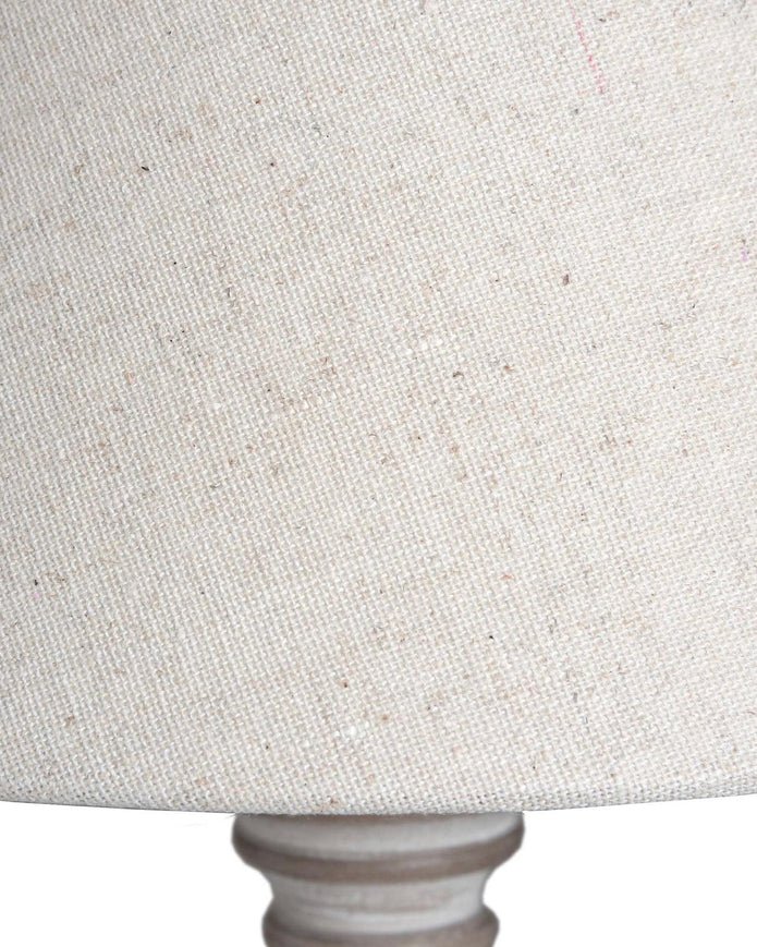Hill Interiors Pella Wooden Table Lamp with a warm-toned wooden base and fabric shade, perfect for cozy lighting.