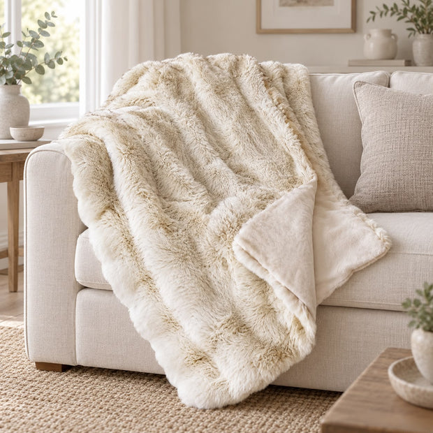 Cream Luxury Faux Fur Blanket Throw, cream faux fur throw draped over a sofa arm