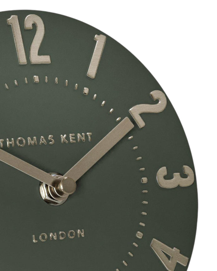 Olive green Thomas Kent 6-inch Mulberry mantle clock with classic design, displayed on a wooden surface.