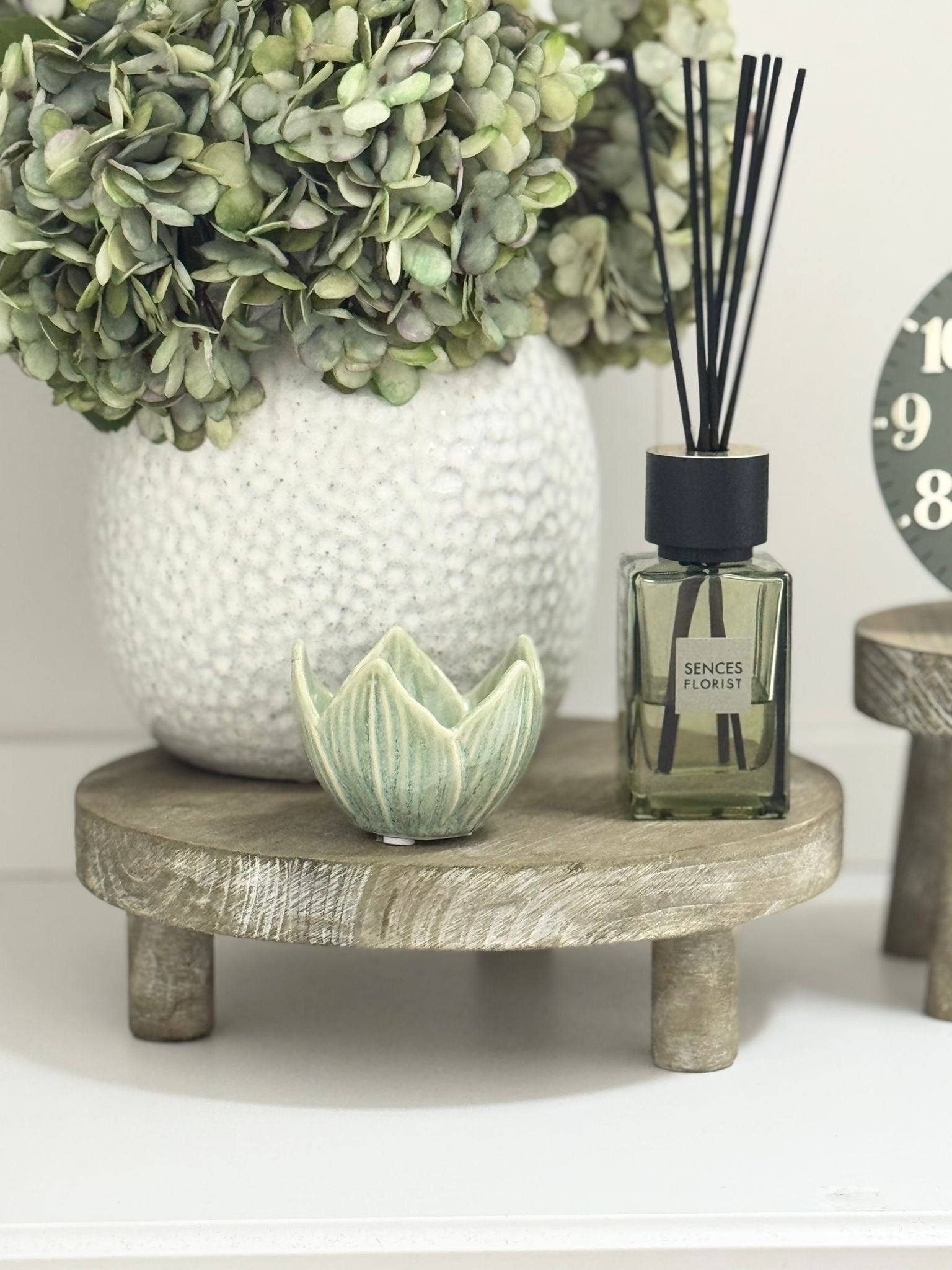 Natural wooden round rustic display riser from Gisela Graham, shown in a small or large size for home decor display or decoration.