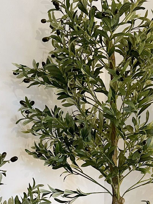 Large artificial faux olive tree by Hill Interiors with lush green leaves and realistic trunk, ideal for home or office decor.