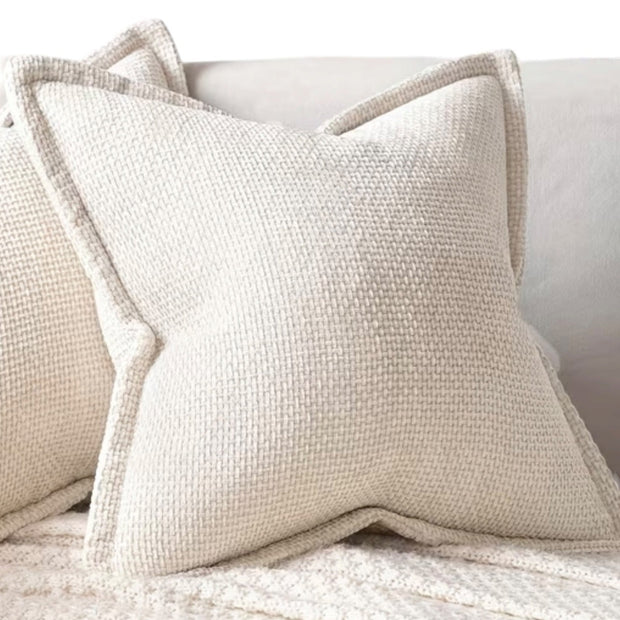 Cream woven design cushion cover from Starlight Express, soft furnishings with intricate woven pattern and plush fabric.