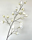 Artificial white lantern stem from Starlight Express, showcasing realistic white lantern-shaped plant with green foliage.
