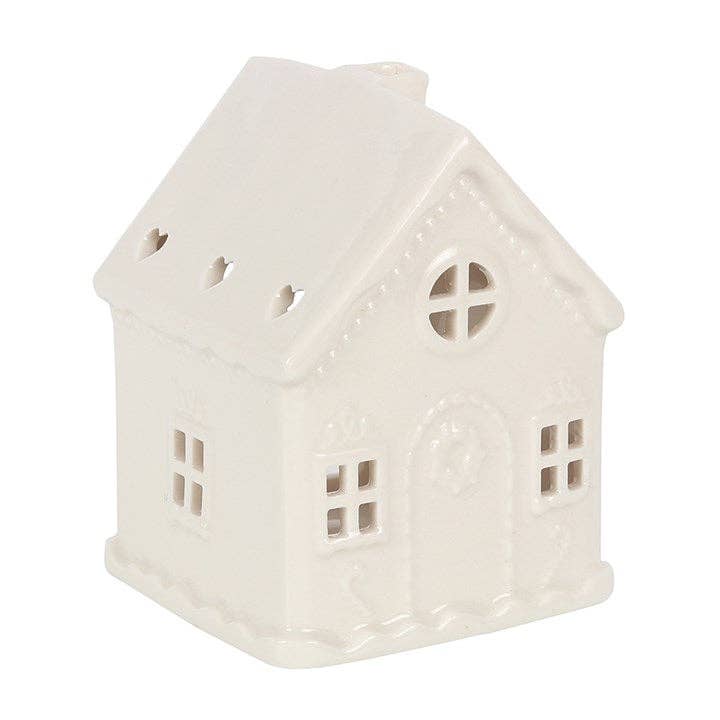 White Christmas gingerbread house tealight candle holder with festive holiday design, made by Something Different Wholesale.